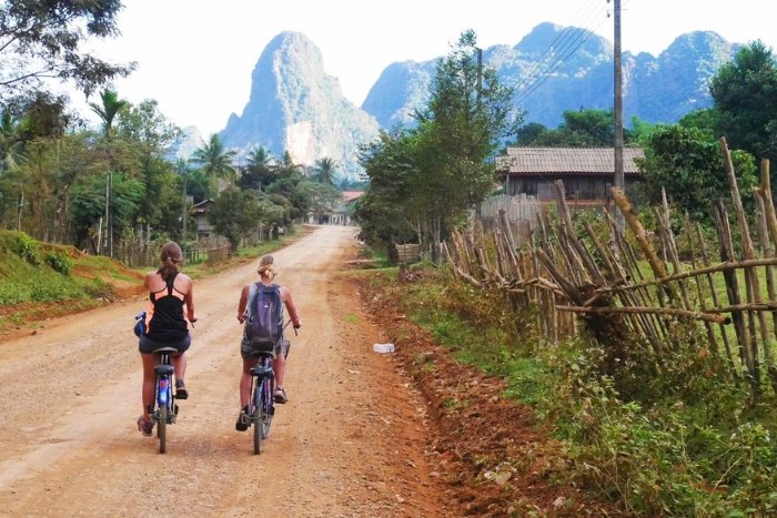 Dust, Karst, and Blue Lagoons: Why a Vang Vieng E-Bike Tour is the Ultimate Adventure